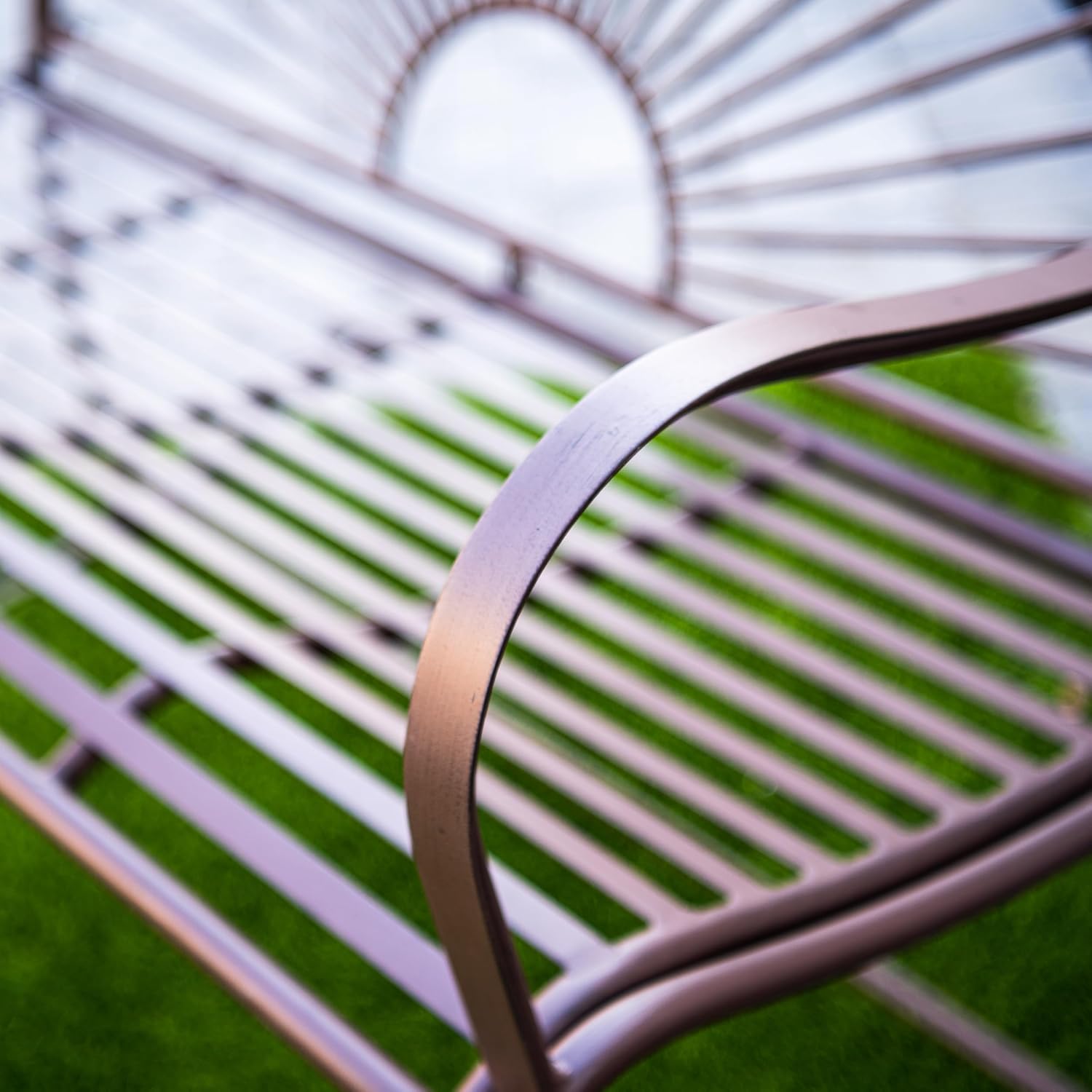 XBrand Outdoor Iron Glider Rocking Bench, Weather-Resistant Patio Glider Rocking Chair with Sun-Pattern Backrest, Heavy-Duty Porch Garden Seating for Yard & Patio, Brown